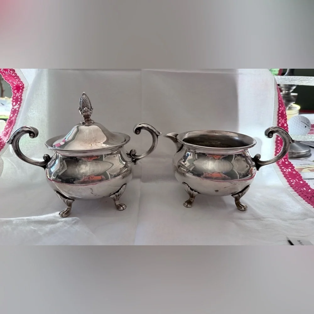 vintage EPCA Bristol by Poole ornate silver-plated sugar bowl and a creamer.